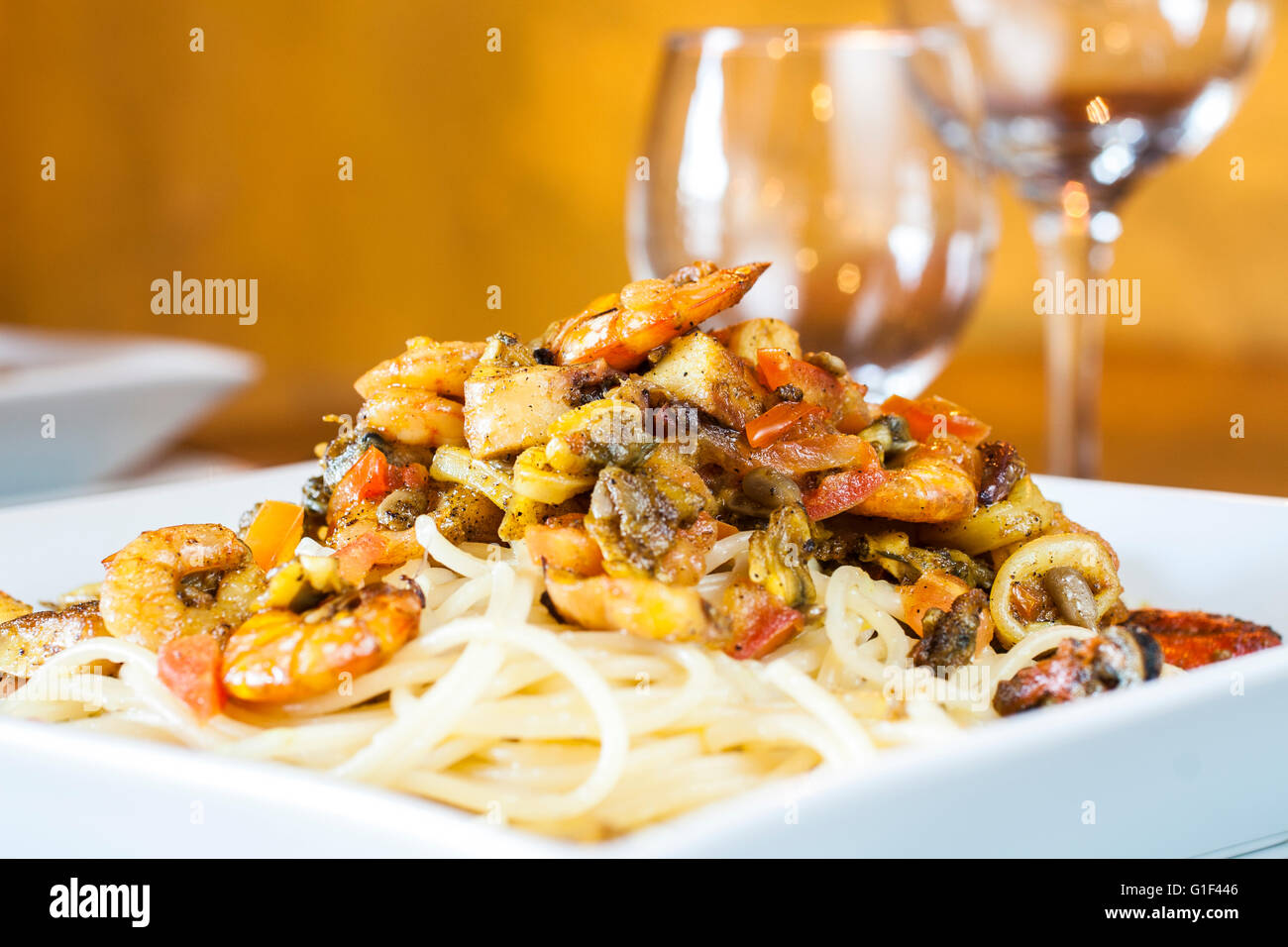 Seafood and pasta dish at a restaurant. Bombinhas, Santa Catarina, Brazil. Stock Photo