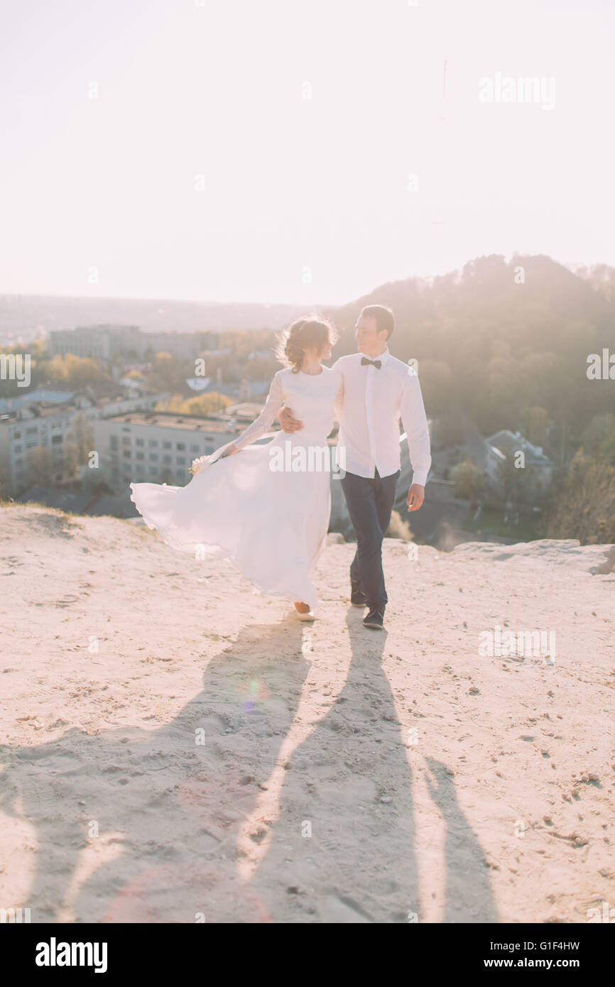 Bride groom walking in city hi-res stock photography and images - Alamy