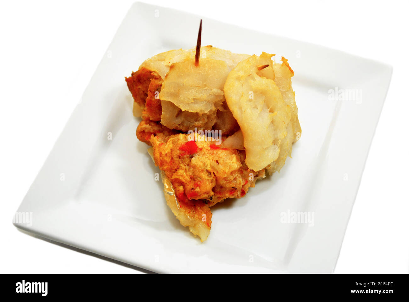 White Fish Appetizer Stuffed with Crabmeat Stuffing Stock Photo - Alamy