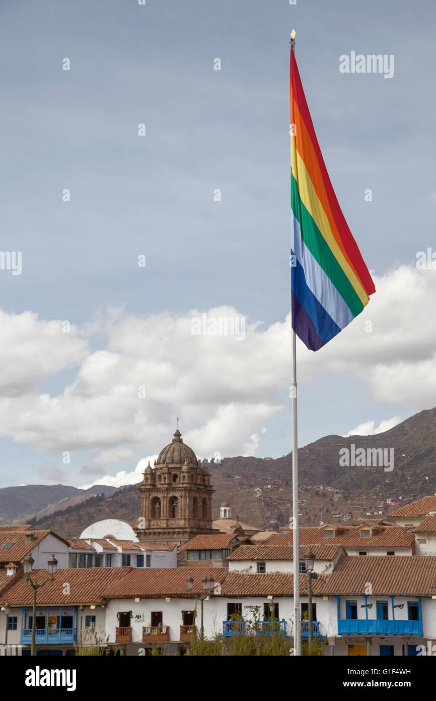 Plaza de Armas in Cuzco with its flag during cloudy morning Stock Photo