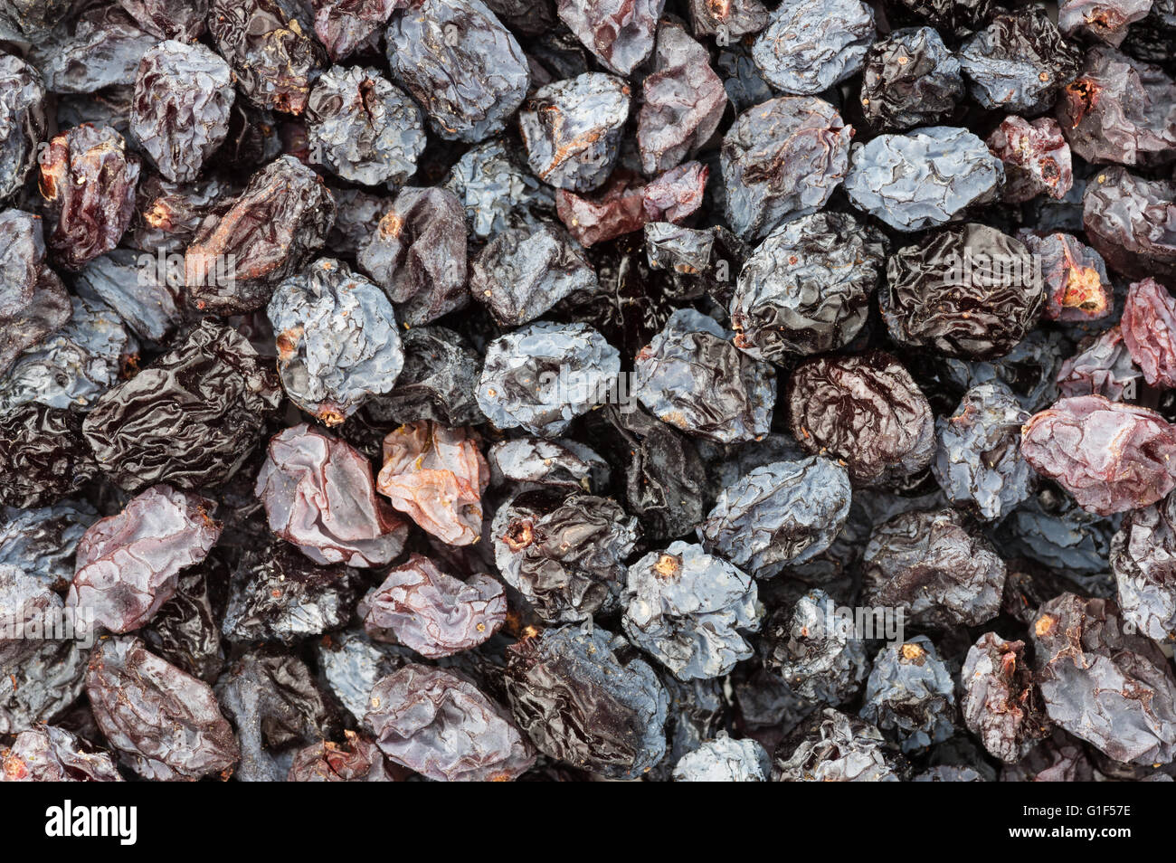 background close up of sun dried raisins Stock Photo