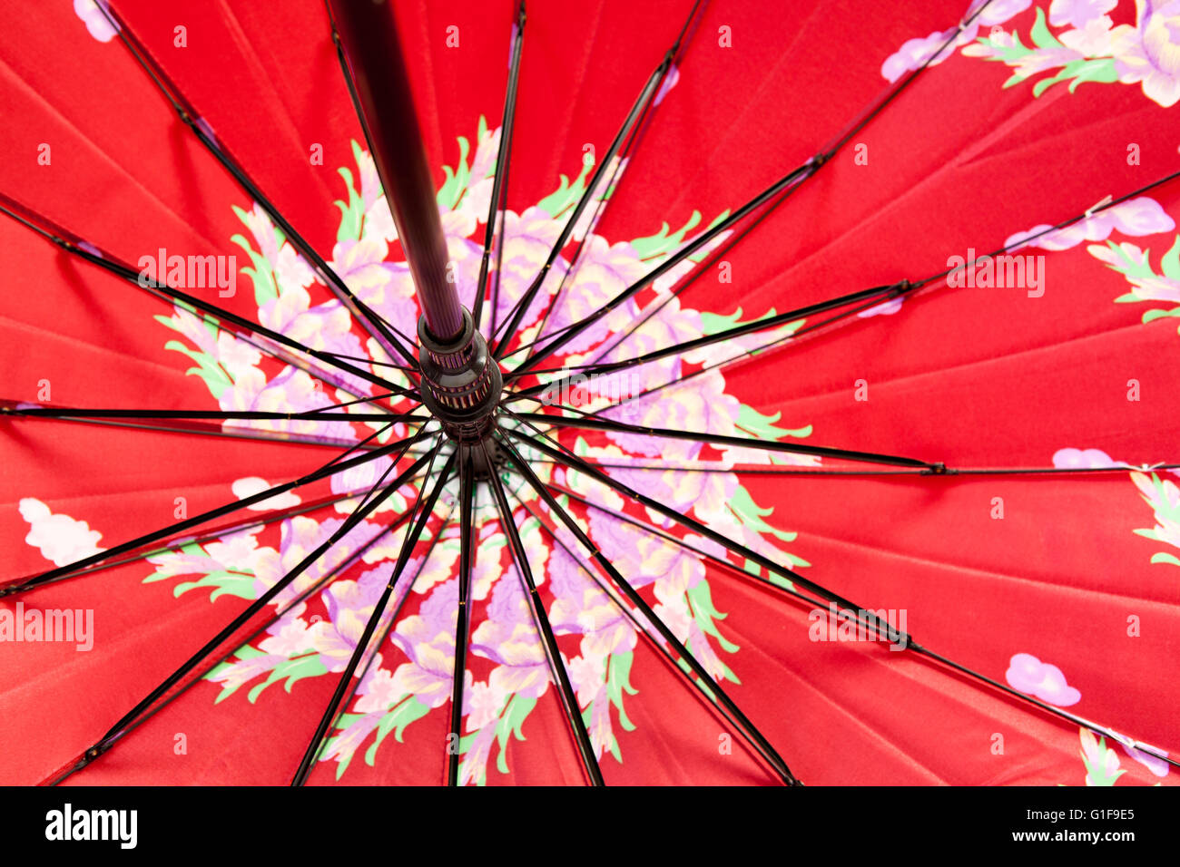 an open umbrella in close up with motive Stock Photo