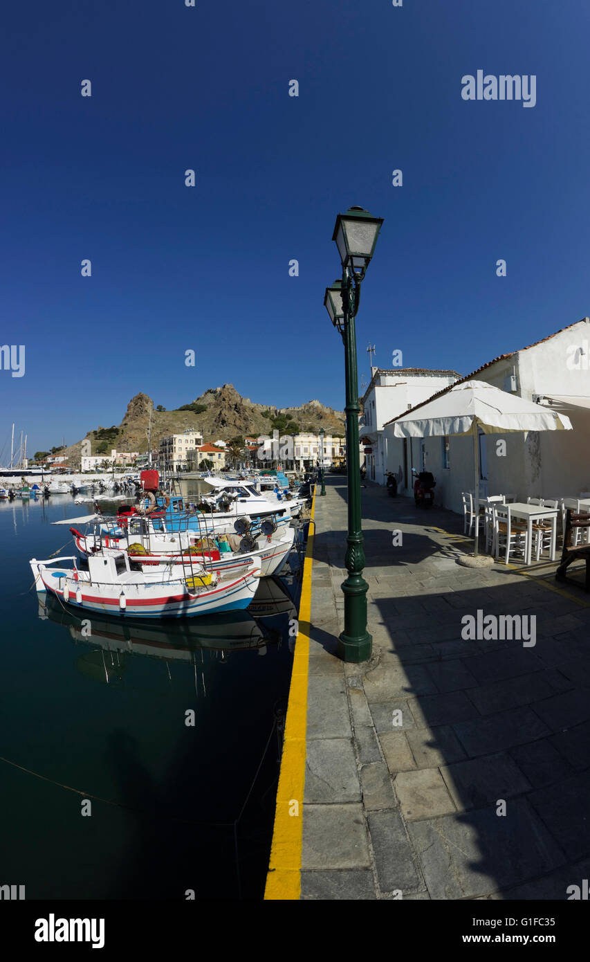 The stone-layered Myrina's quay waterfront pedestrian access area. Limnos or Lemnos island, Greece Stock Photo