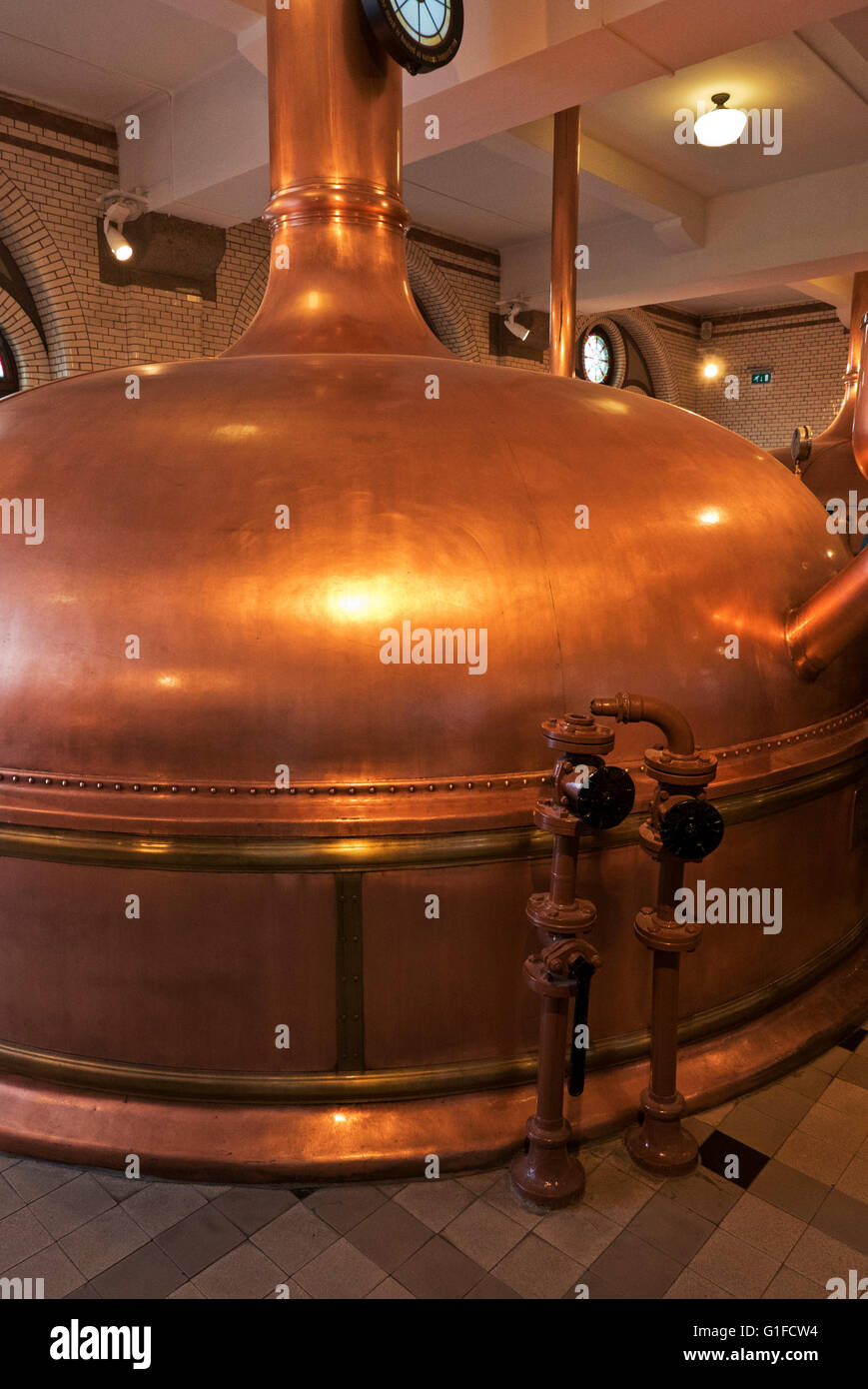 A big traditional Copper tank for brewing Heineken beer at the Heineken Museum in Amsterdam, Holland, Netherlands. Stock Photo