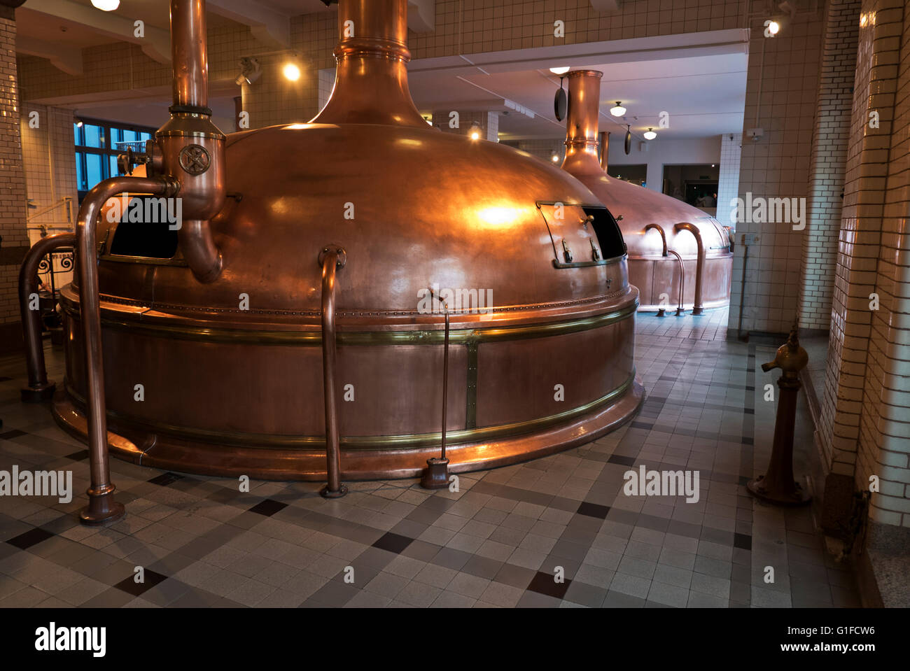 Traditional Copper tanks for brewing Heineken beer at the Heineken Museum in Amsterdam, Holland, Netherlands. Stock Photo