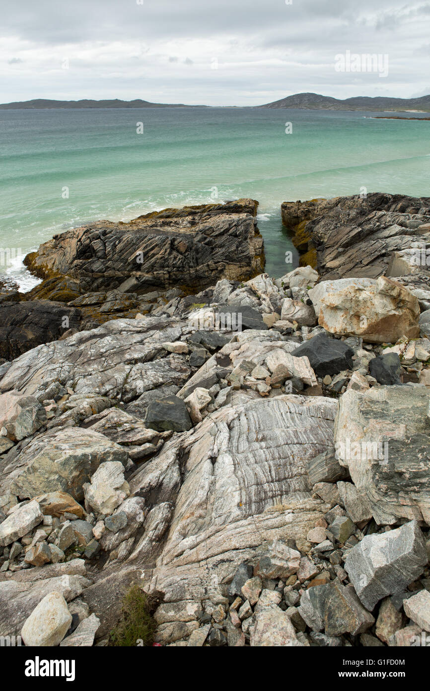 Beautiful rocky coastline and clear seas near Borve beach, Isle of Harris, Outer Hebrides, Scotland, UK Stock Photo