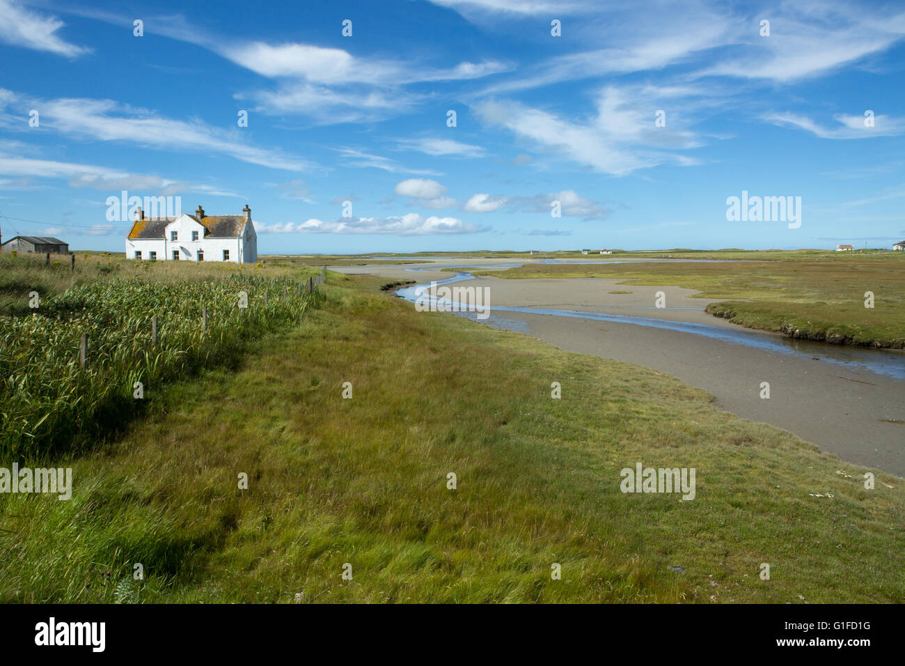 Traditional farm house and beach in North Uist, Outer Hebrides, Scotland Stock Photo