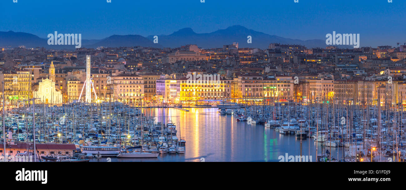 Vieux port and notre dame de la garde by night hi-res stock photography ...