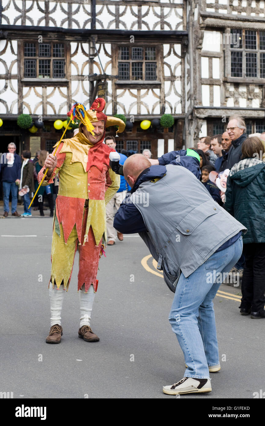 Photographer taking a picture of a court jester in Stratford upon Avon Stock Photo