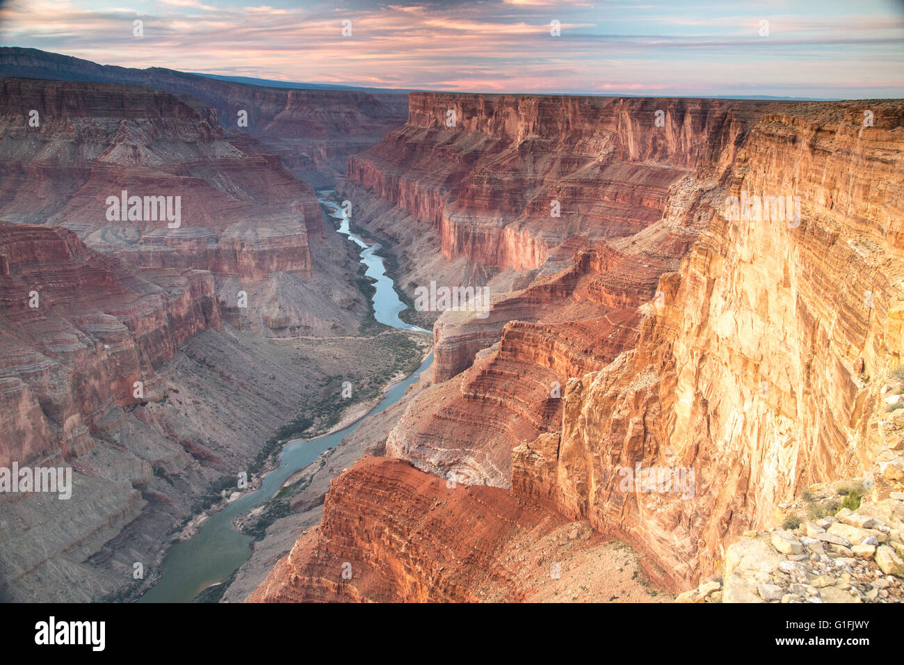 Sunset on Colorado river looking north up Marble Canyon from the East Rim of the Grand Canyon, Arizona Stock Photo