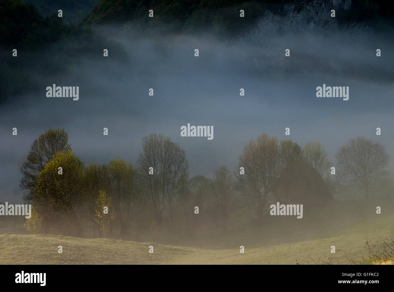Morning fog in mountain village hi-res stock photography and images - Alamy