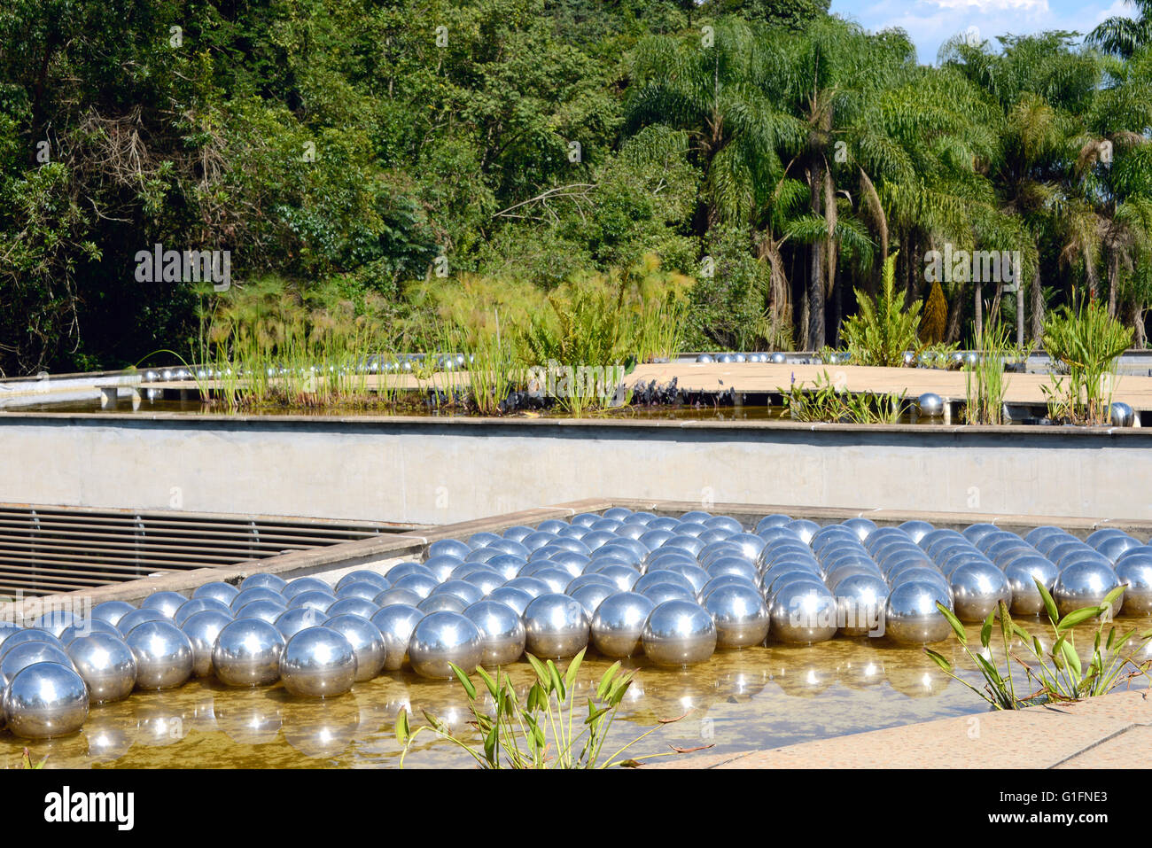 Brunadinho, Inhotim, Minas Gerais, Brazil - FEBRUARY 2013: Yayoi Kusama Narcissus garden, stainless steel balls on water in the Stock Photo