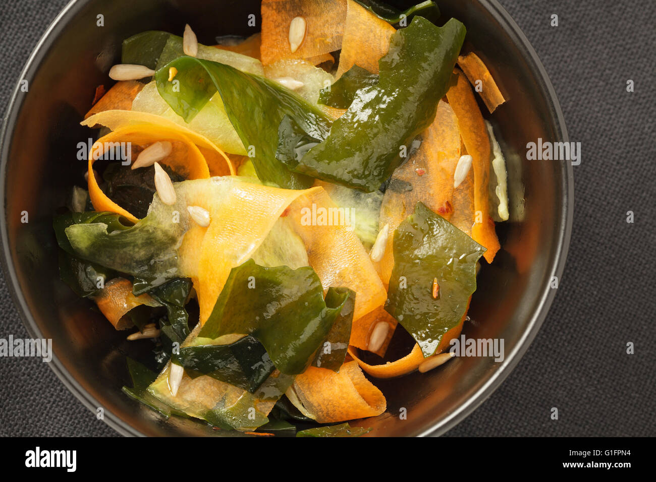 Wakame seaweed carrot and cucumber salad Stock Photo