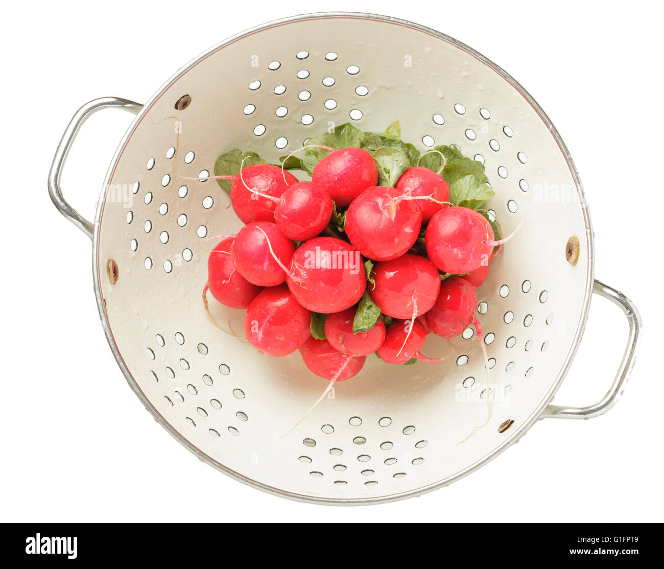 radishes in colander Stock Photo