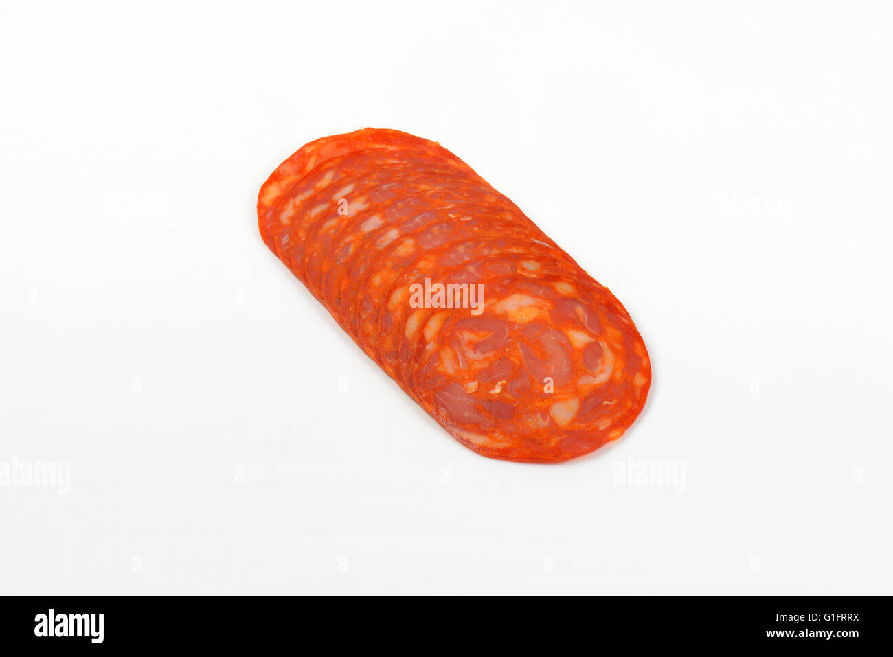slices of chorizo salami on white background Stock Photo Alamy