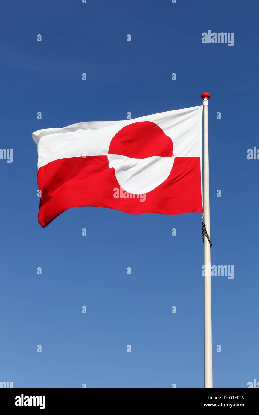 Flag of Greenland waving in the sky Stock Photo