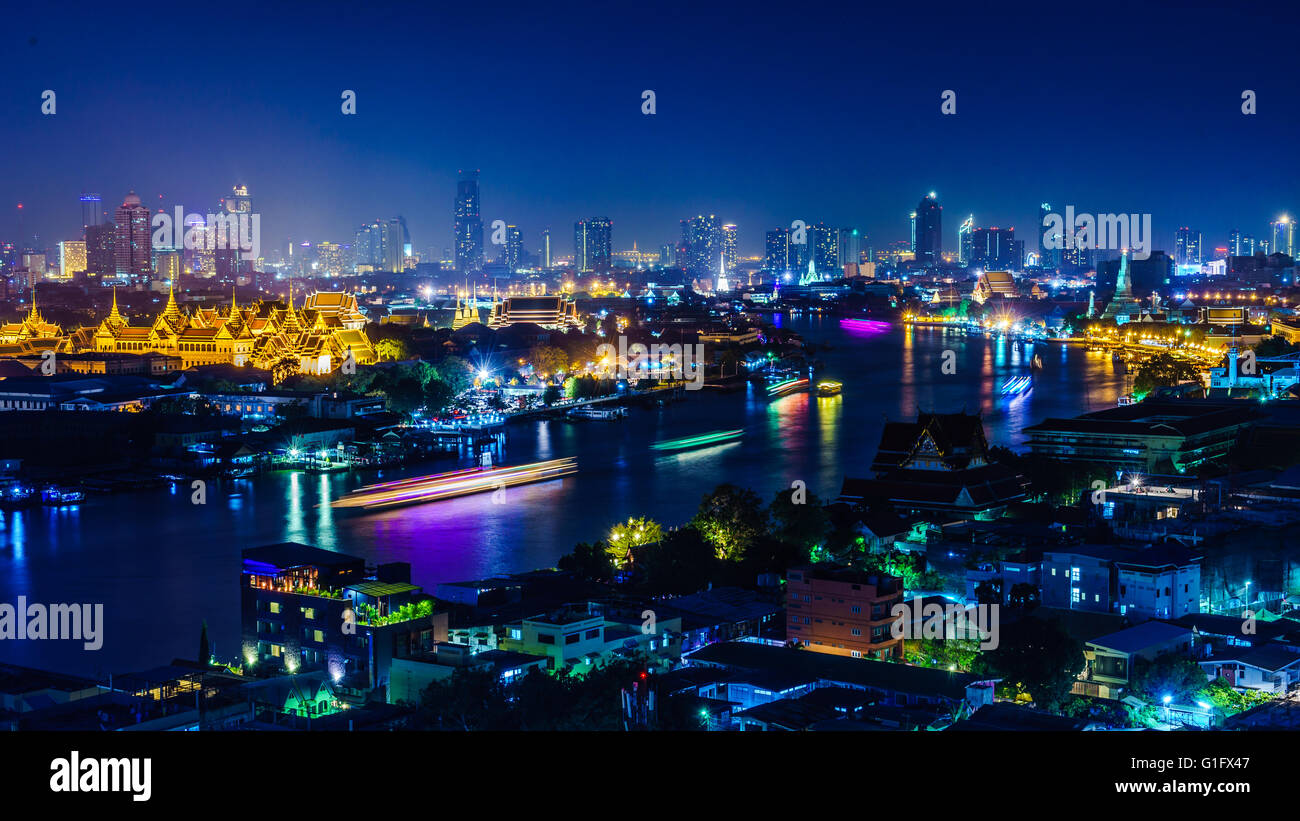 Night scene of Chao Phraya River with major landmarks of Bangkok ,The Grand Palace,Temple of Dawn,Temple of the reclining buddha Stock Photo