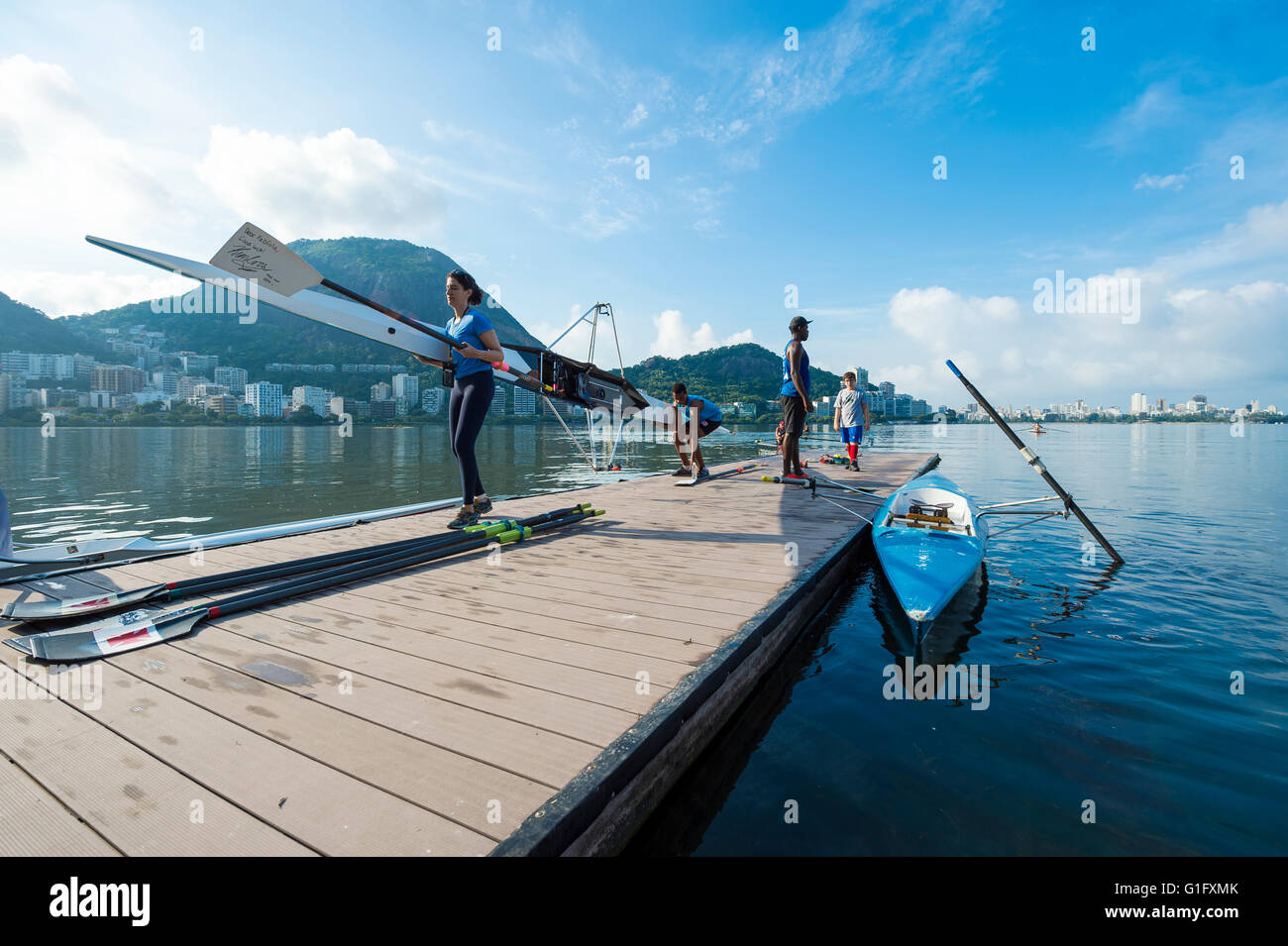 RIO DE JANEIRO - MARCH 22, 2016: After training, Brazilian rowers carry ...