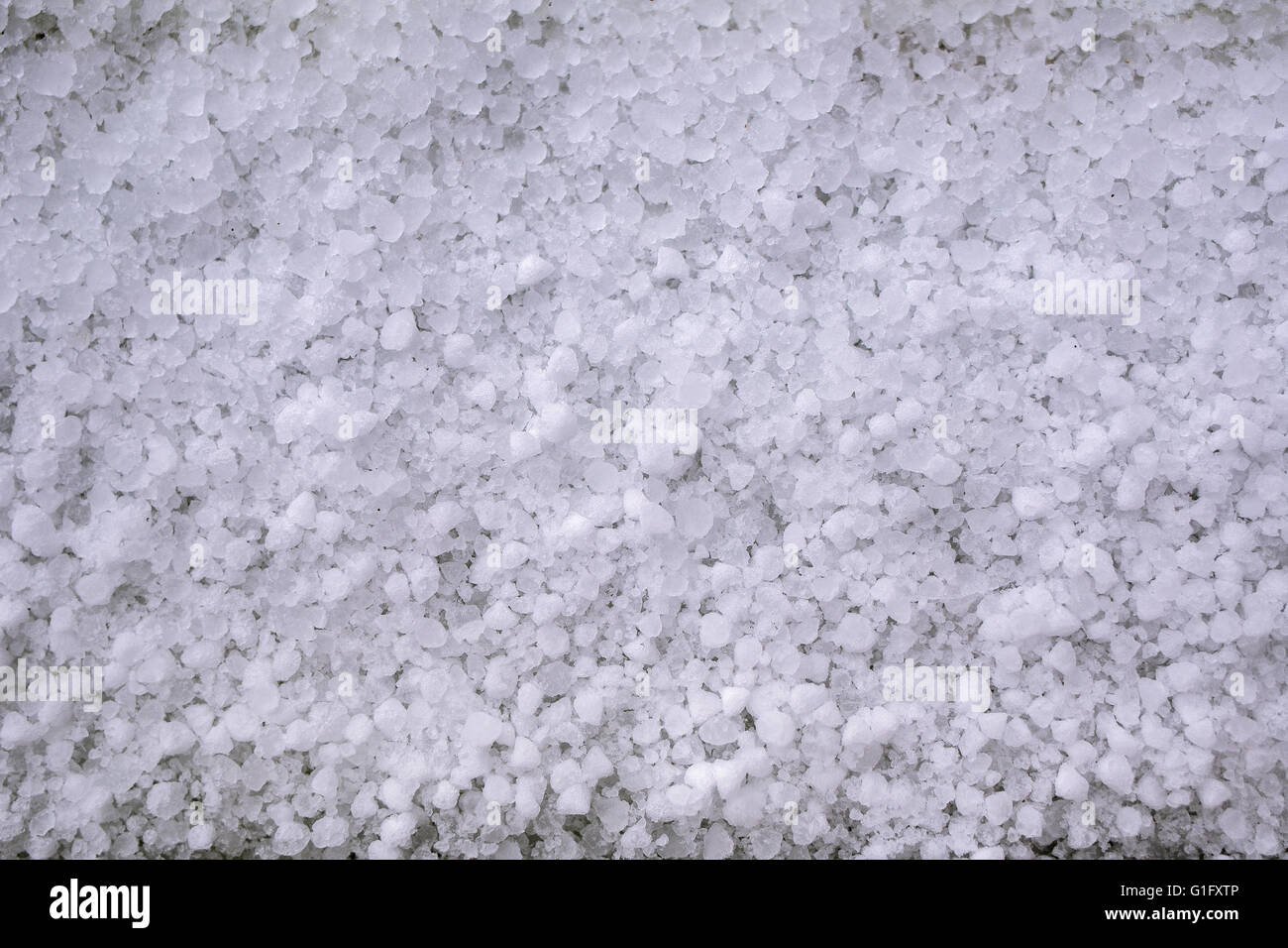 Hail background. Closeup of windowsill after hailstorm Stock Photo