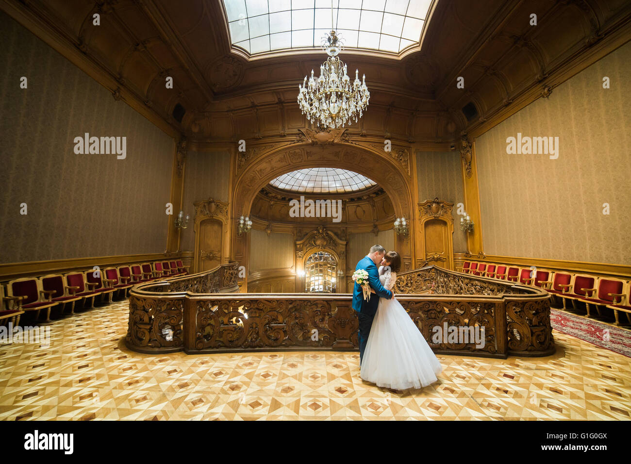 Elegant Wedding Couple Dancing At Vintage House In The Front Of Old Stained Glass Ceiling Stock 