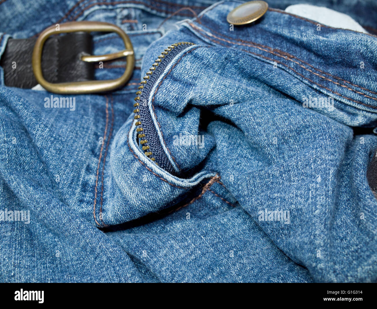 Blue denim jeans and belt Stock Photo Alamy
