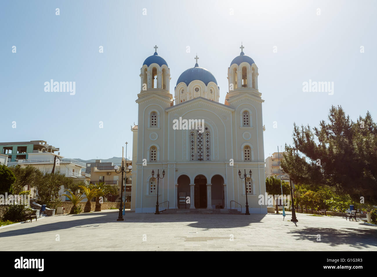 The historic church of St. Nikolaos in Karystos, Evia, Greece against a blue sky in the afternoon Stock Photo
