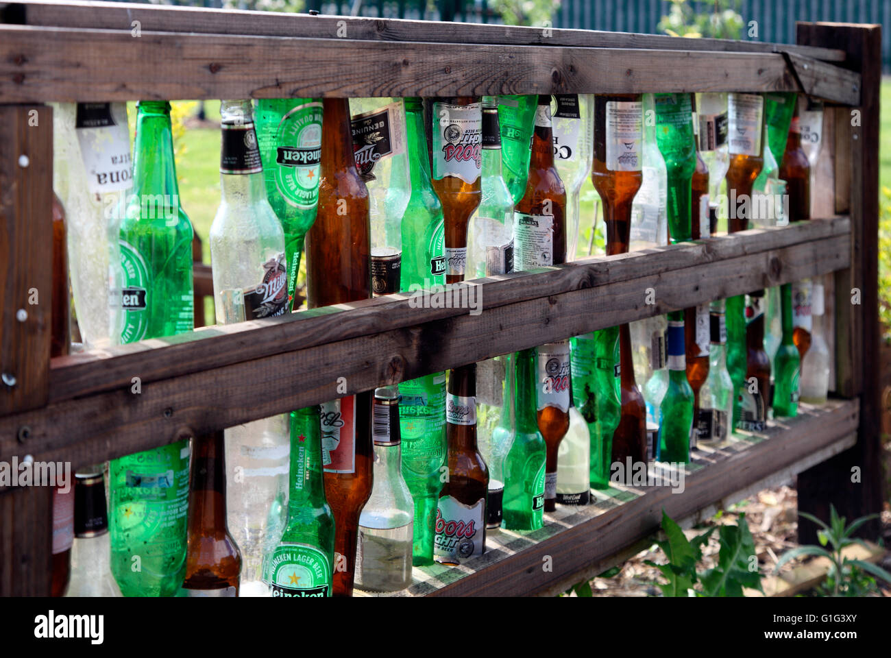 Beer bottle fence at Carrickmacross Community Allotments Stock Photo