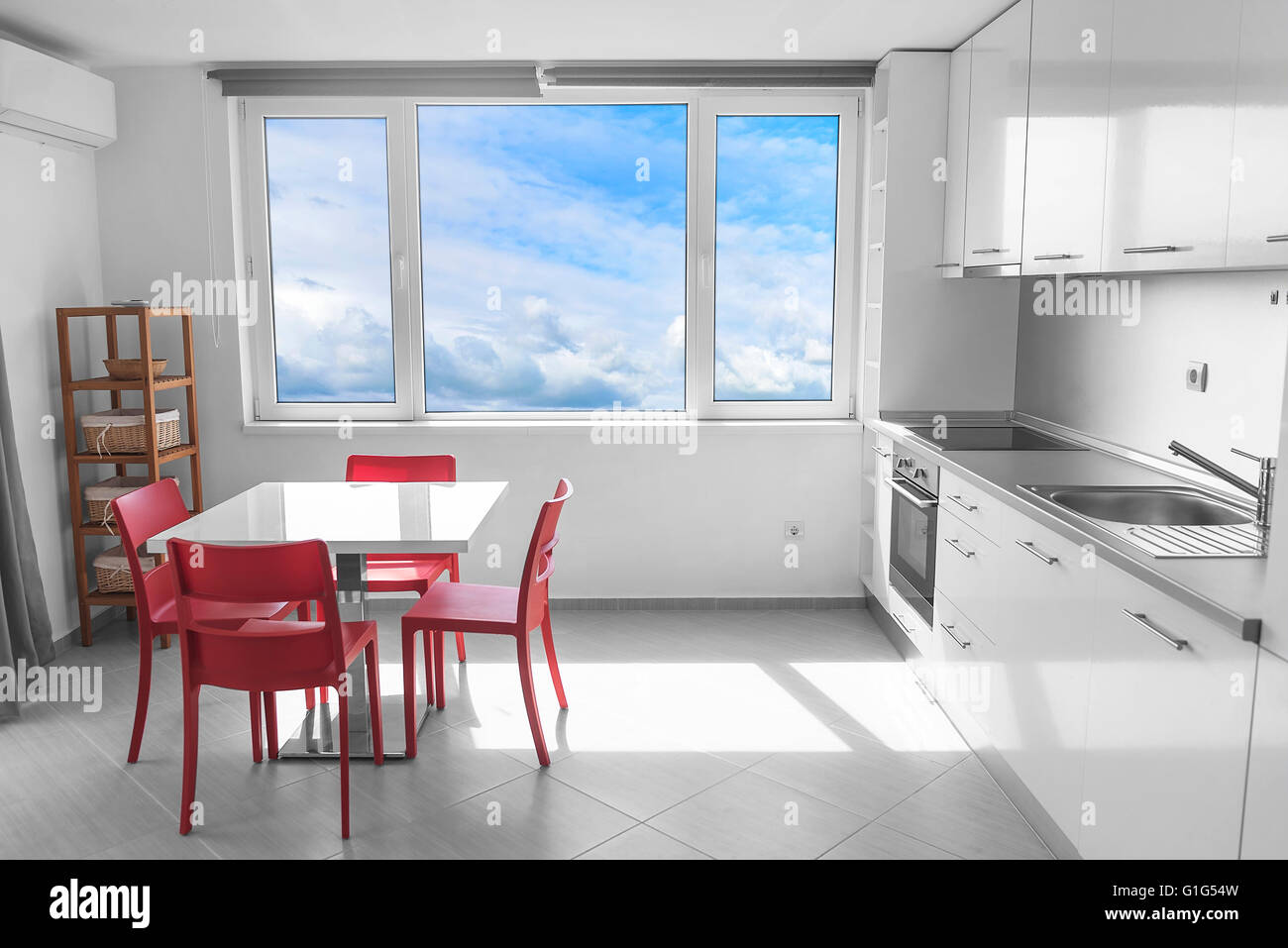 Modern white kitchen interior with lake view in the window Stock Photo ...