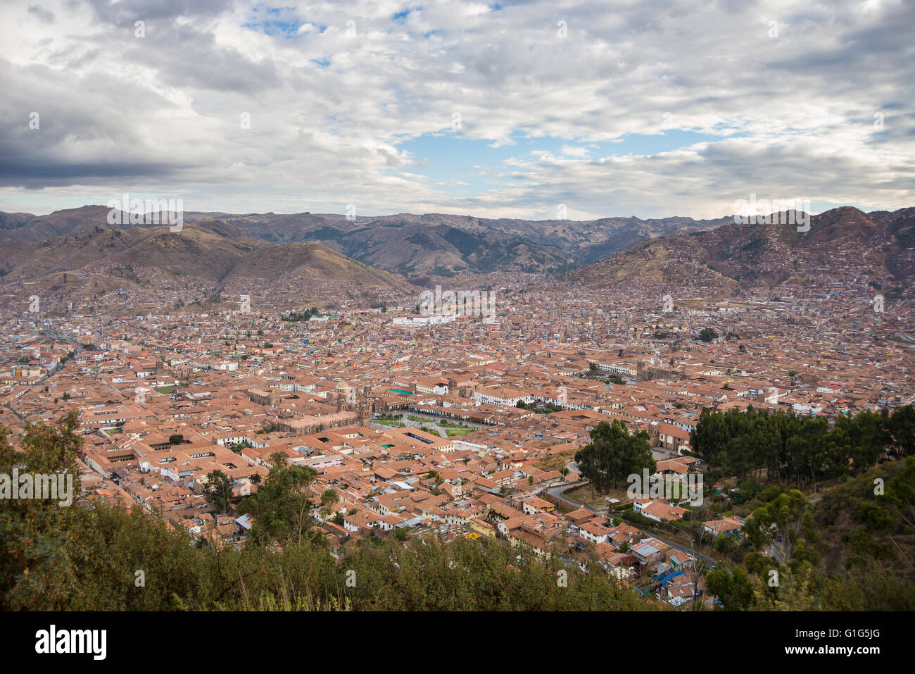 Expansive cityscape of Cusco town with scenic cloudscape. Cusco is among the most important travel destination in Peru and the e Stock Photo