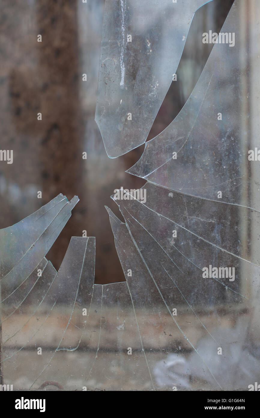 Damage from impact stone or bullets Stock Photo - Alamy