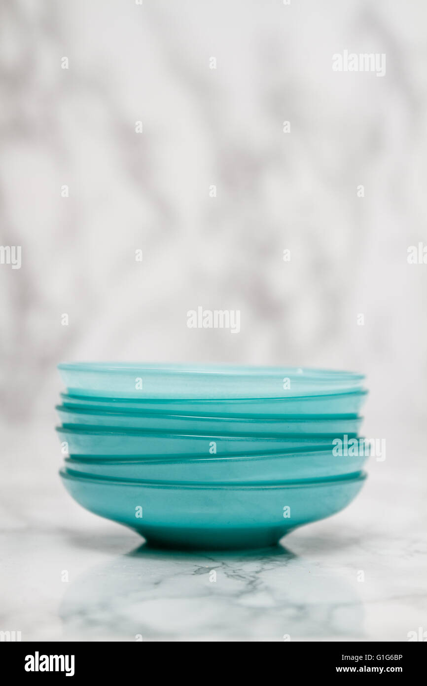 Traditional green Turkish tea plates on white marble background Stock