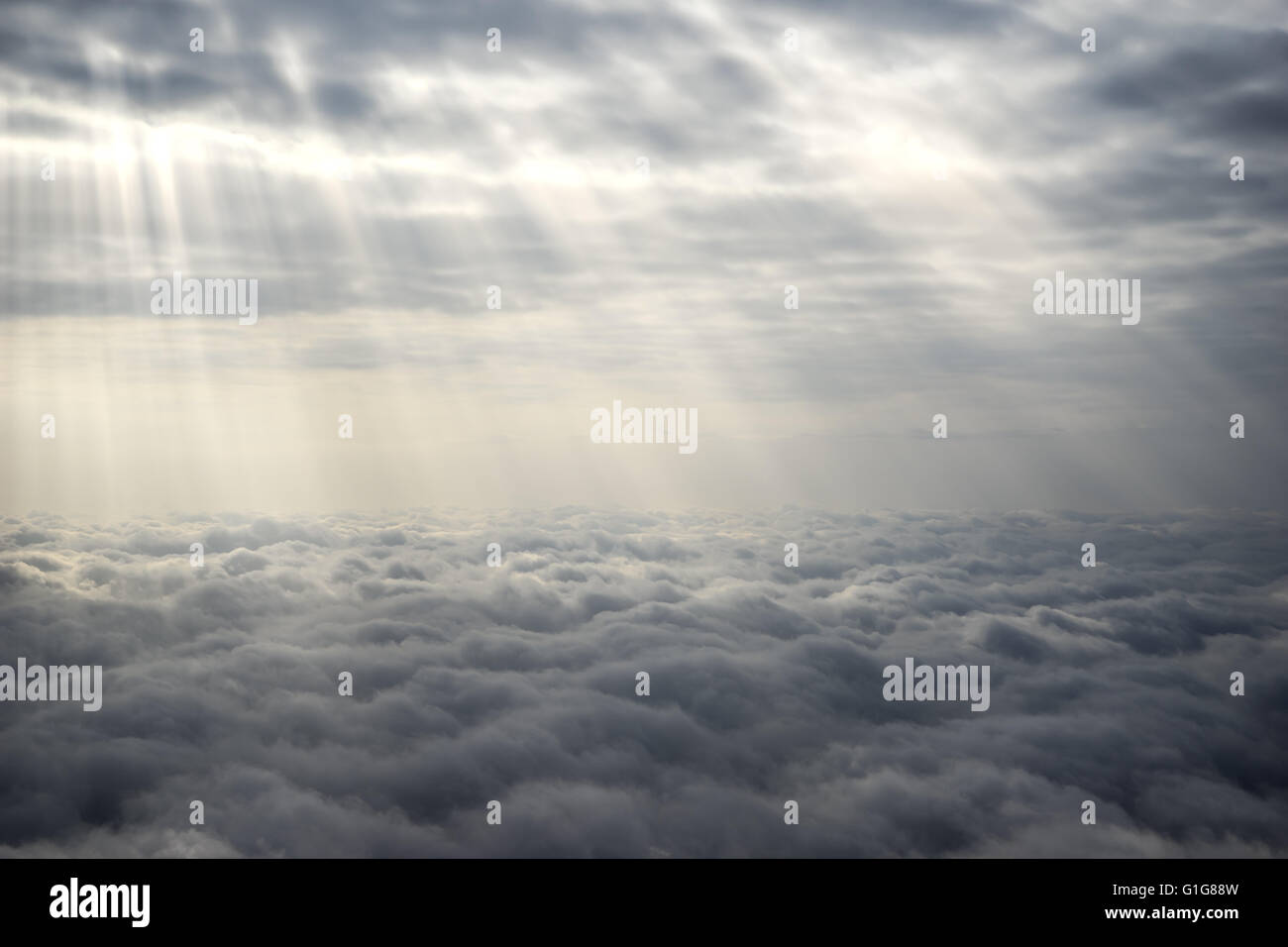 Sun Rays Over The Clouds Stock Photo