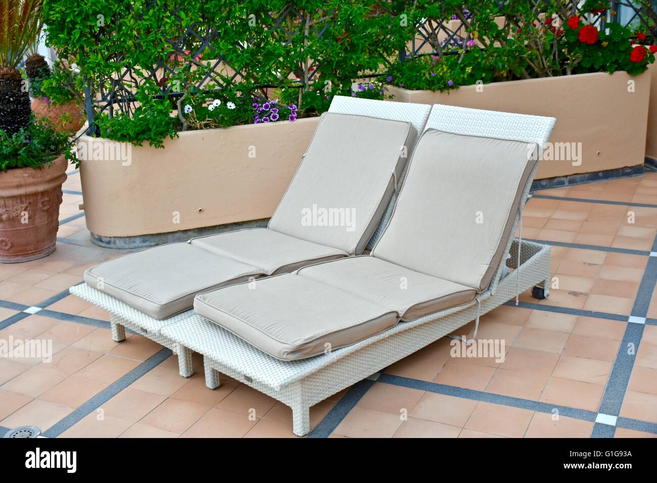 Two lounge chairs in a rooftop balcony Stock Photo