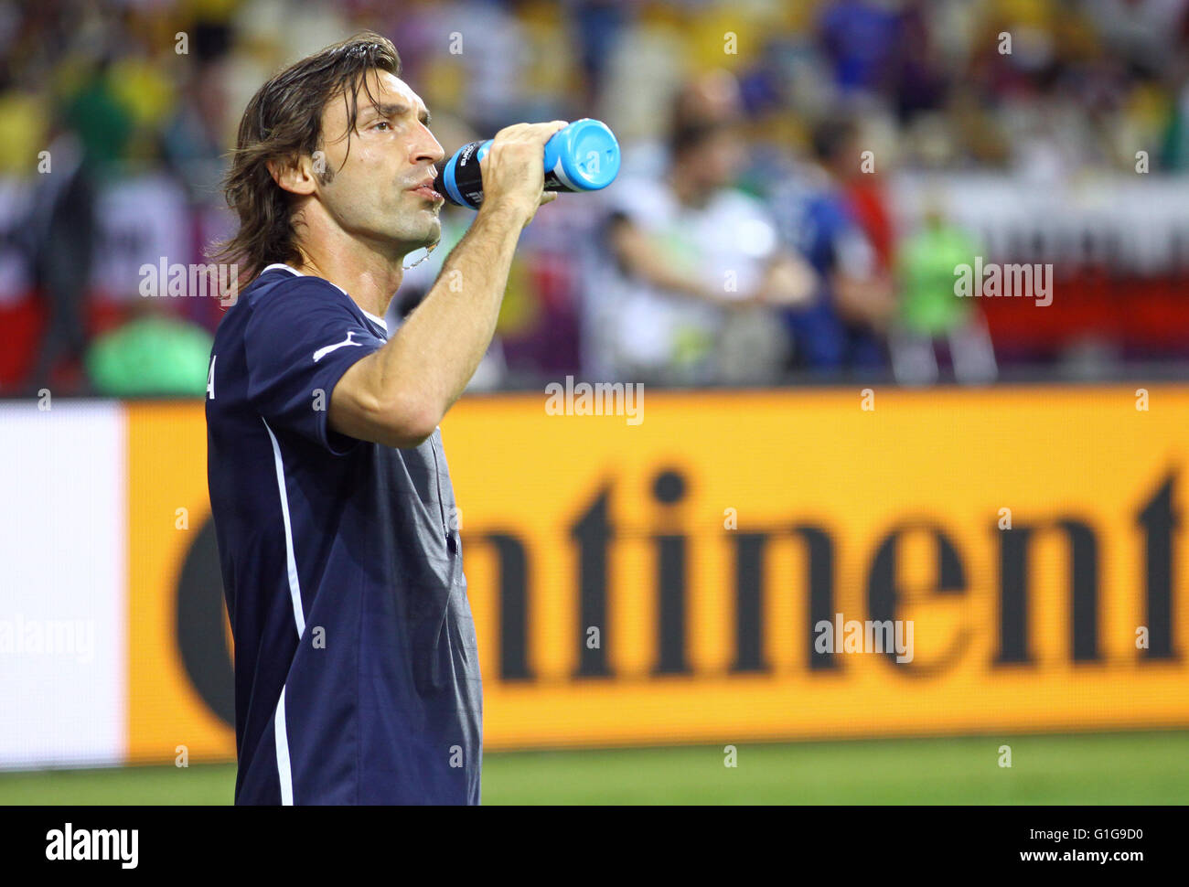 KYIV, UKRAINE - JULY 1, 2012: Andrea Pirlo of Italy drinks water during warm-up session before UEFA EURO 2012 Final game against Stock Photo