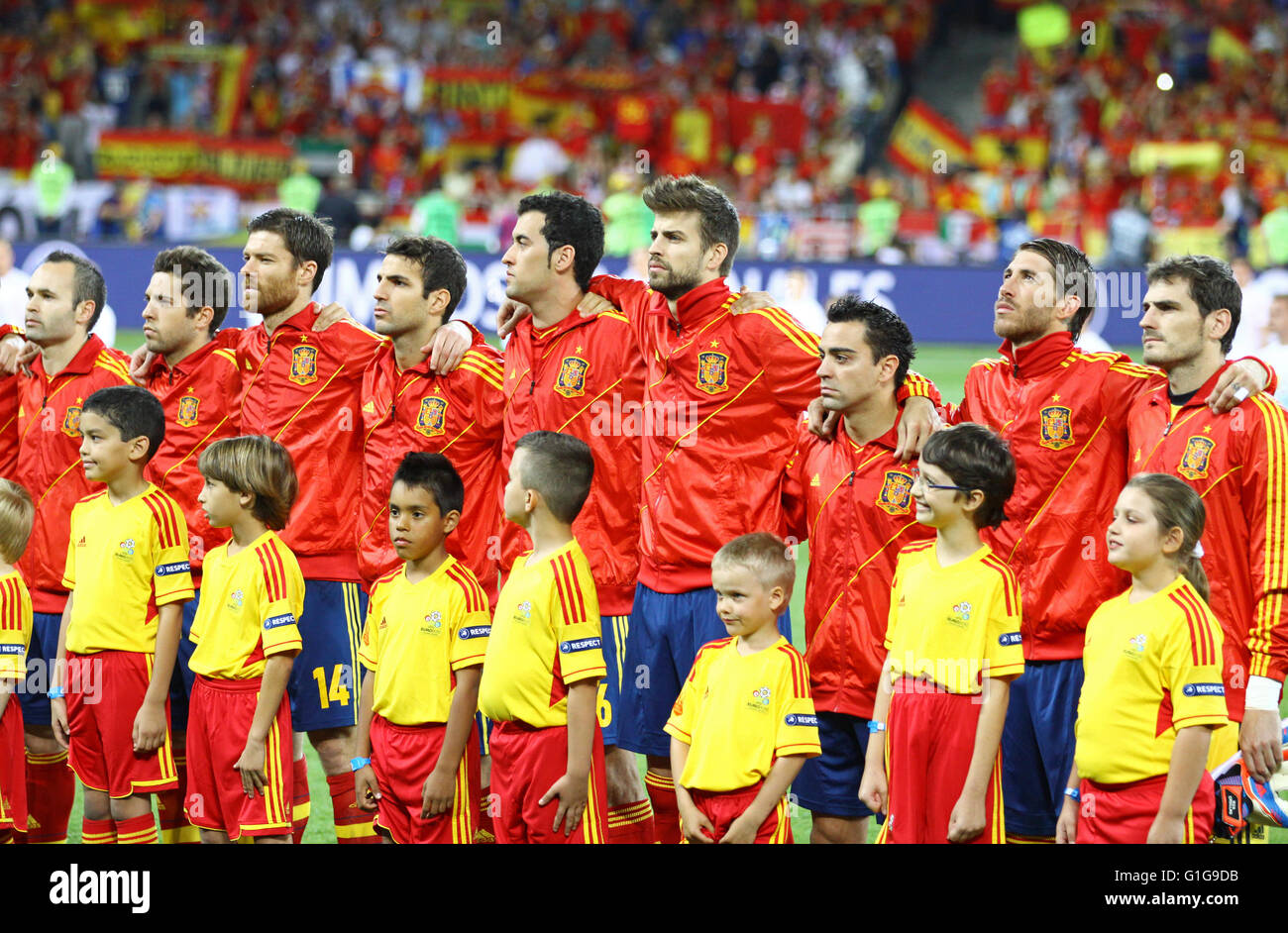 Players of Spain football team sing the national anthen before UEFA EURO 2012 Final game against Italy at Olympic stadium Stock Photo