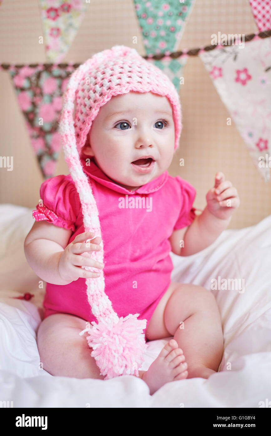Little girl with pink hat hires stock photography and images Alamy