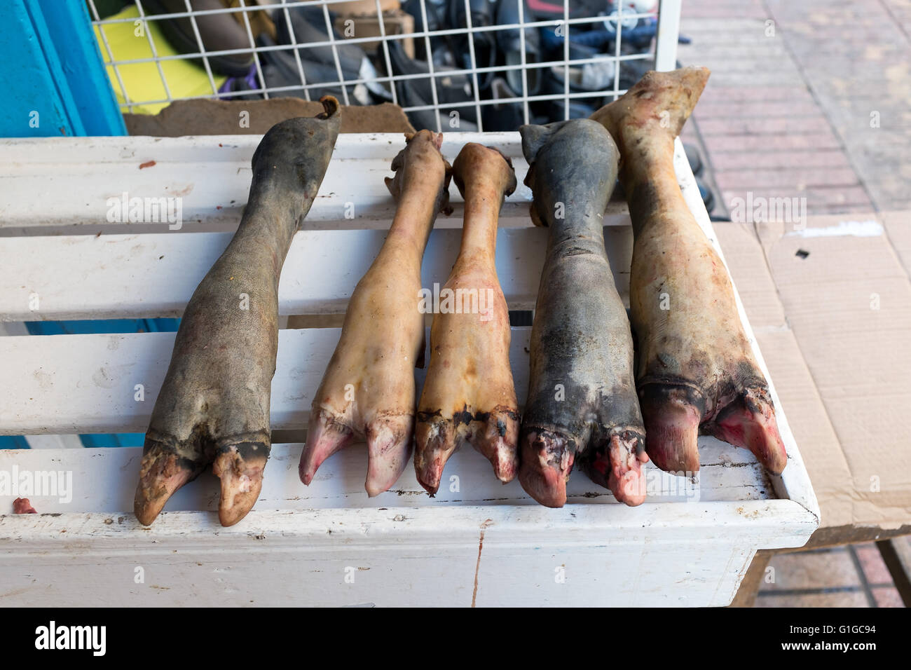 Severed cow legs in the medina street market of Essaouira, Morocco Stock Photo
