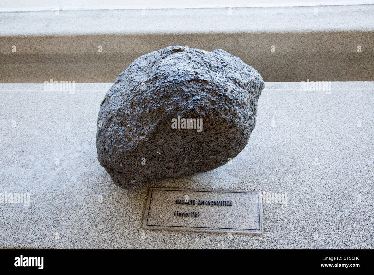 Ankaramite basalt rock sample geology display, Casa de los Volcanes volcanic study centre, Lanzarote, Canary island, Spain Stock Photo