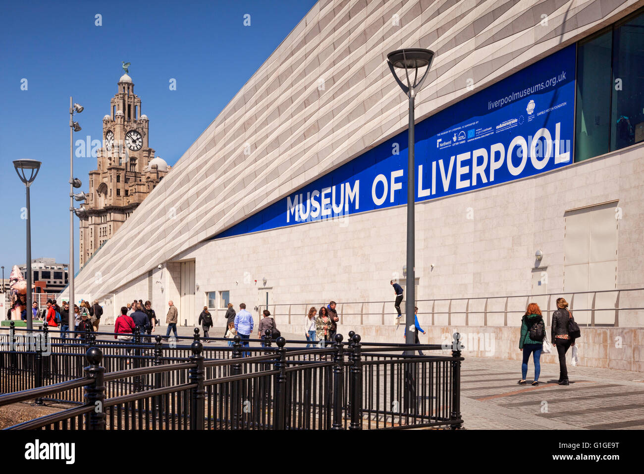 Museum of Liverpool, Pier Head, Liverpool, England, UK, by 3XN, and in the background, the Royal Liver Building. Stock Photo