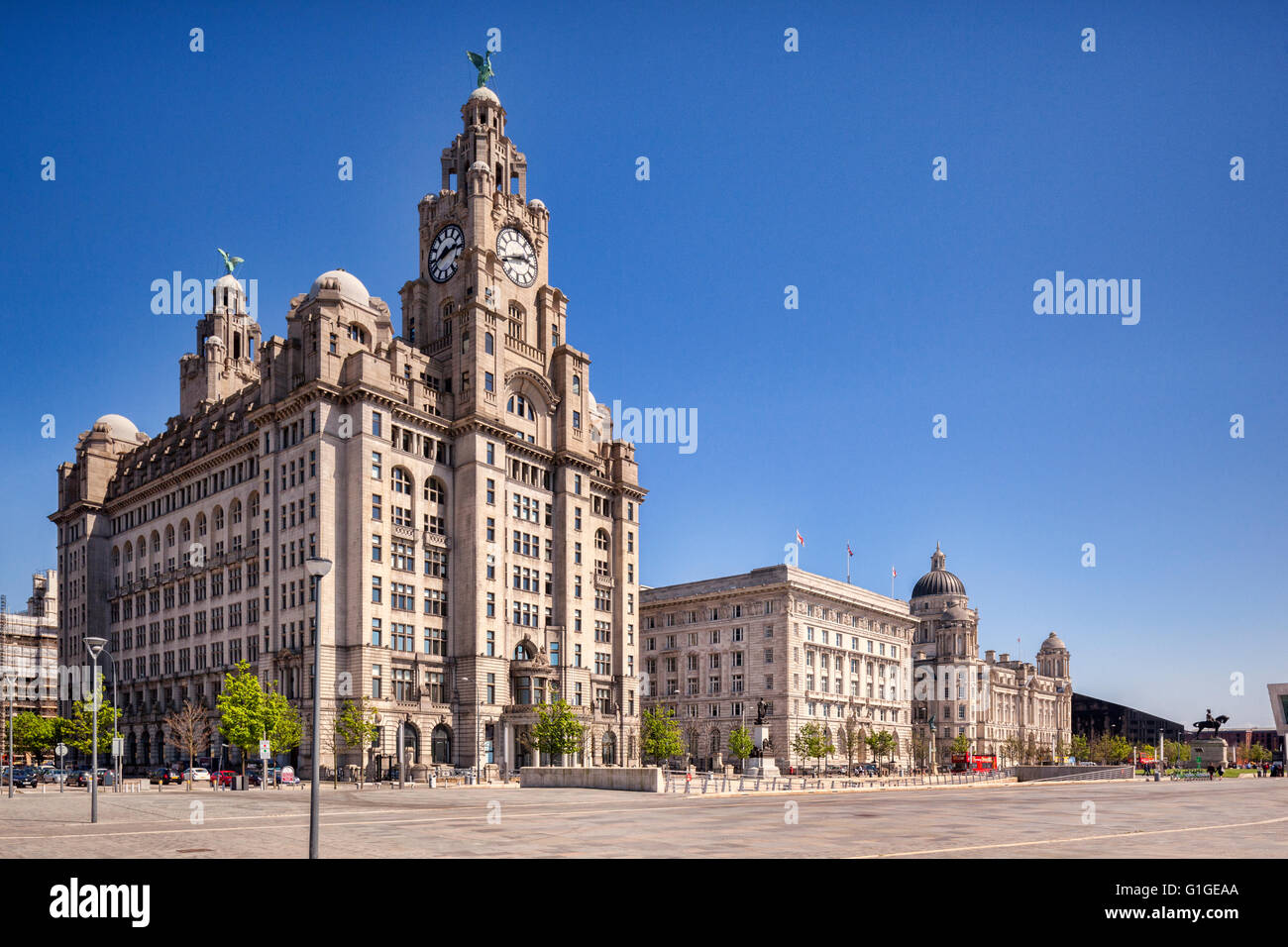 The 'Three Graces', historic buildings which dominate the Liverpool waterfront at Pier Head. They are the Royal Liver Building, Stock Photo