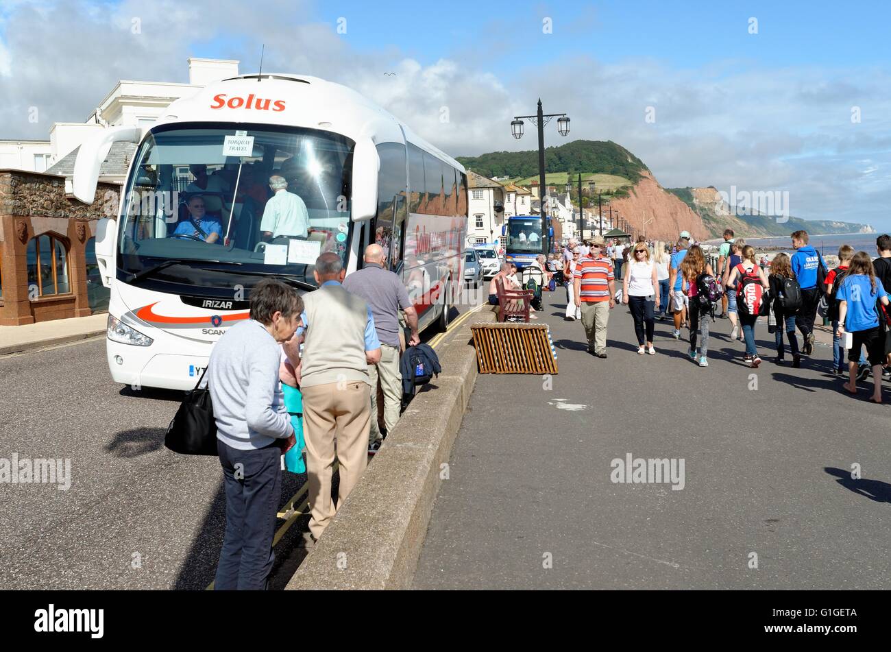 Busy Sidmouth seafront on a hot summers day  UK Stock Photo