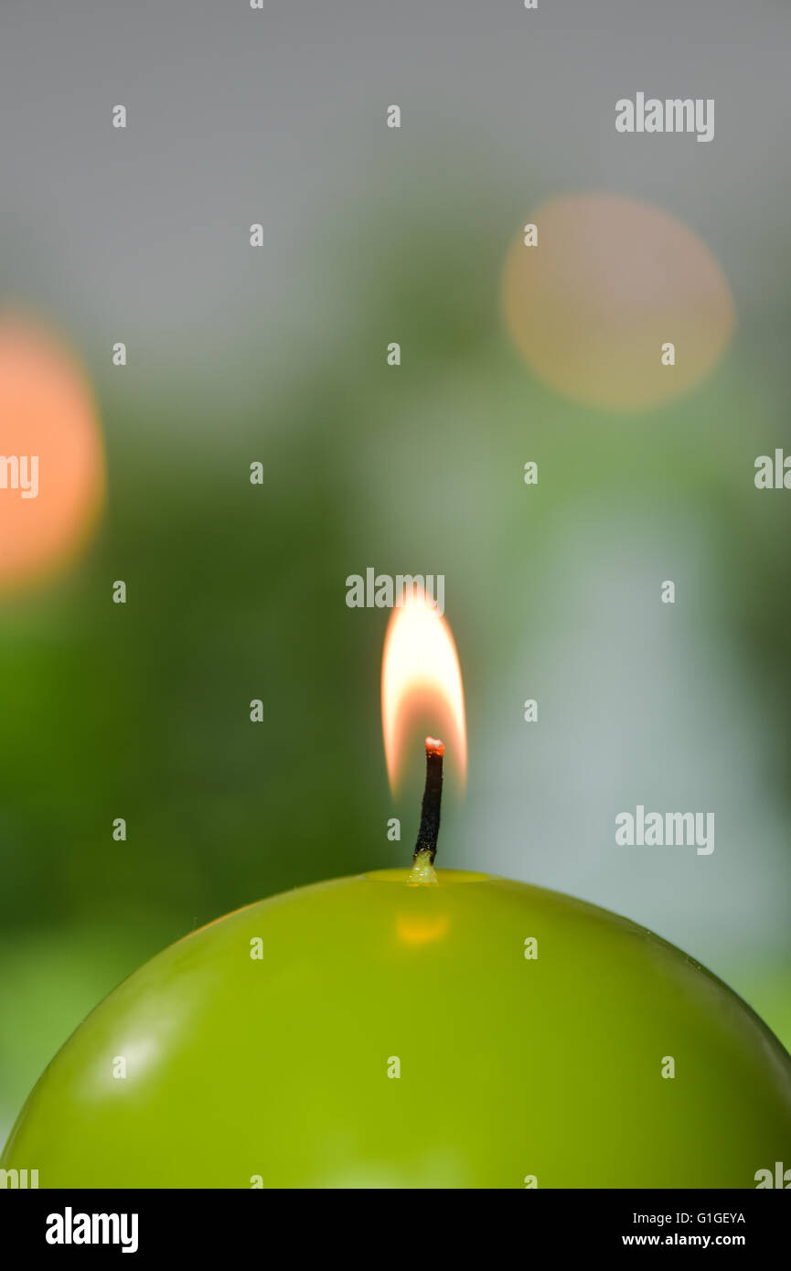 Burning candles Green and red candles studio shoot Stock Photo Alamy
