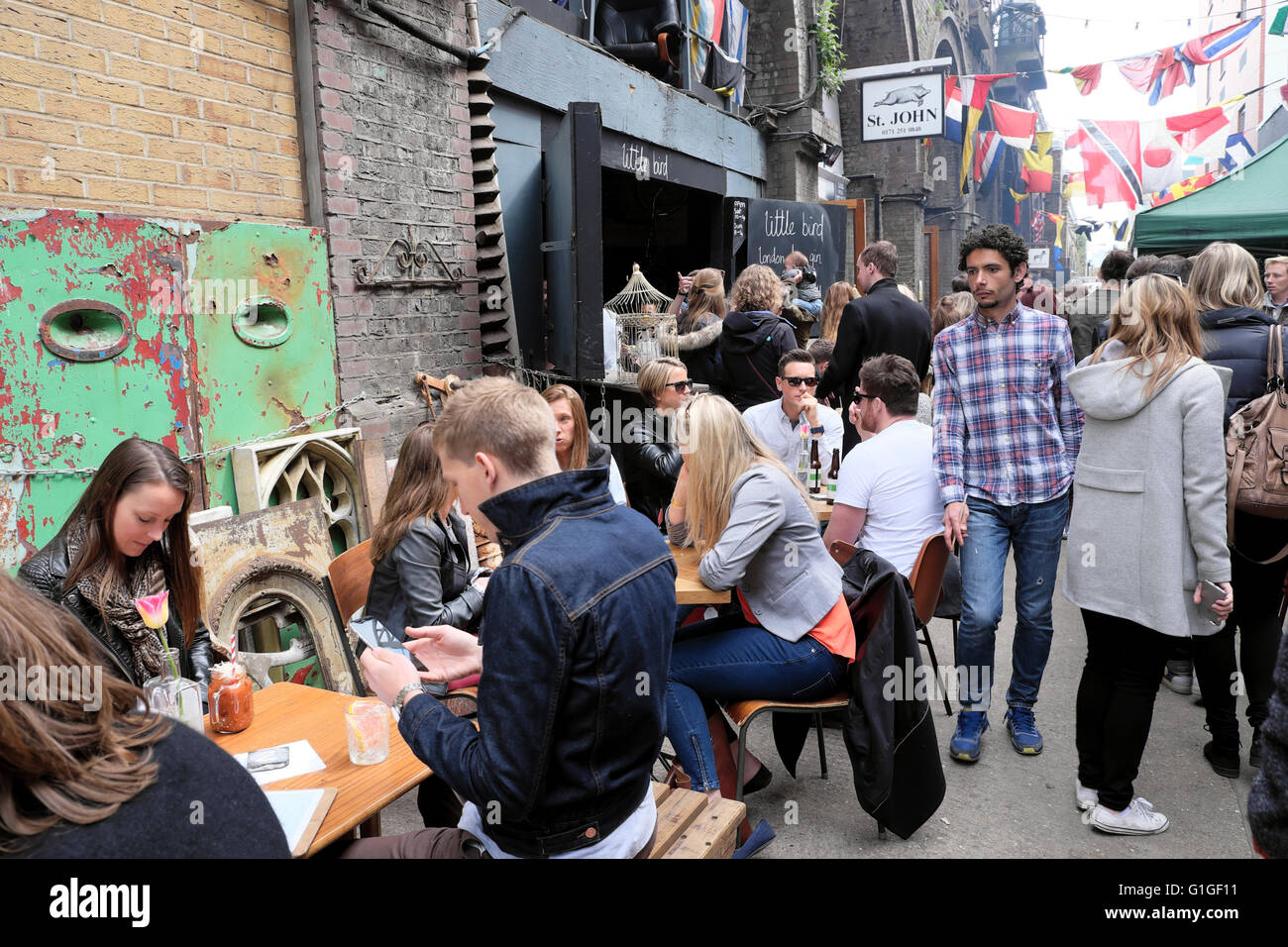 Crowd people walking eating at artisan street food in ROPEWALK market