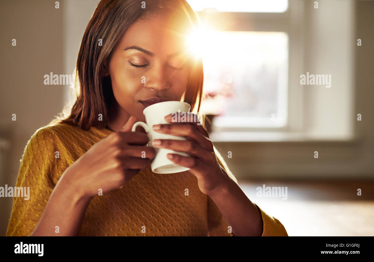 Attractive young black woman hi-res stock photography and images - Alamy