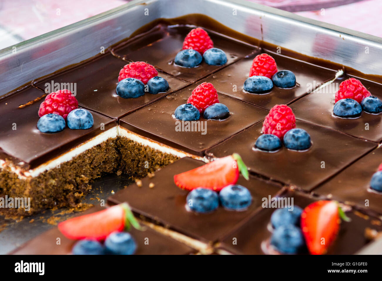 Tasty chocolate pastry with fresh berries. Stock Photo