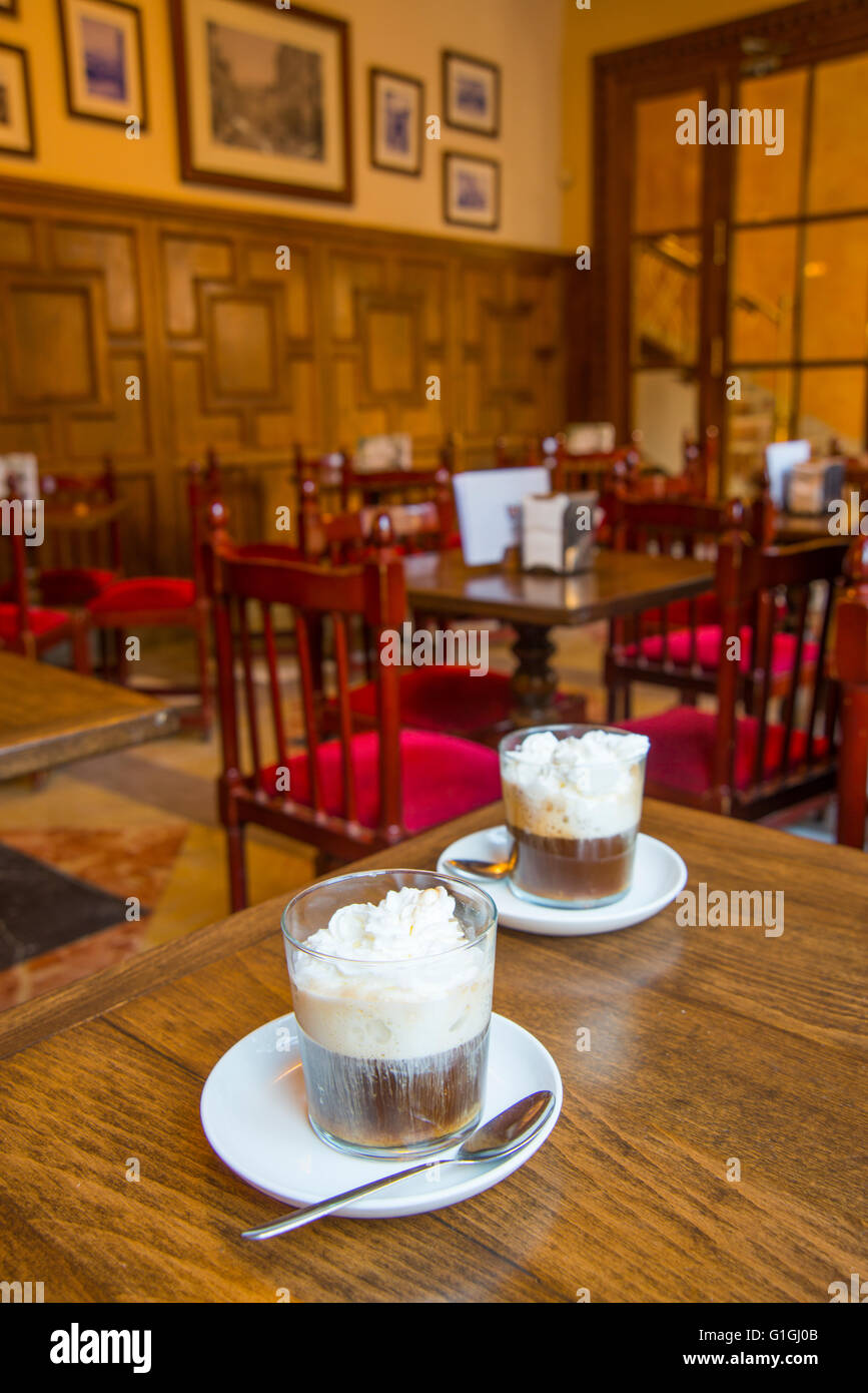 Two Irish coffees in a traditional cafe. San Lorenzo del Escorial, Madrid province, Spain. Stock Photo