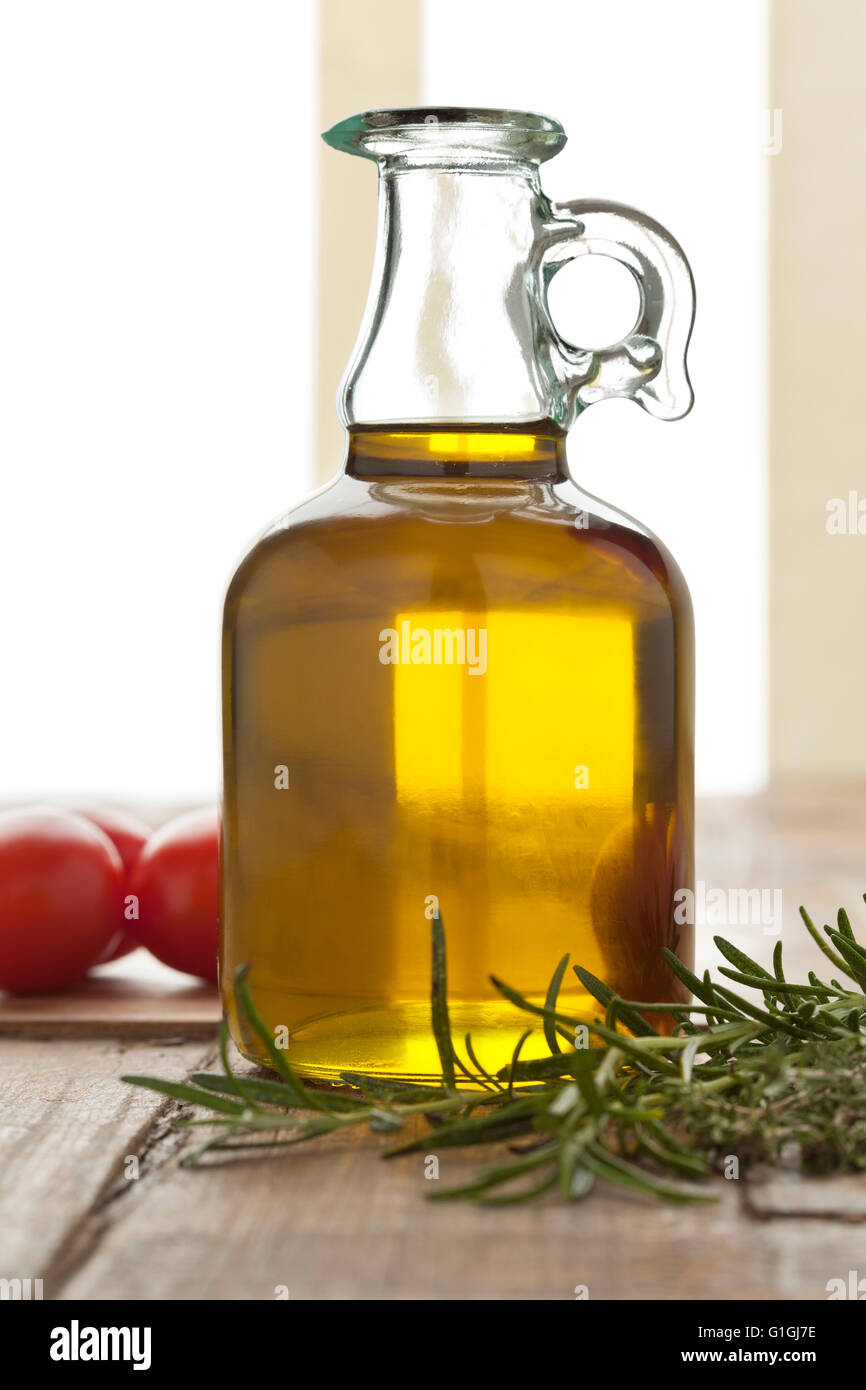 Bottle of olive oil ingredient to cook Stock Photo Alamy