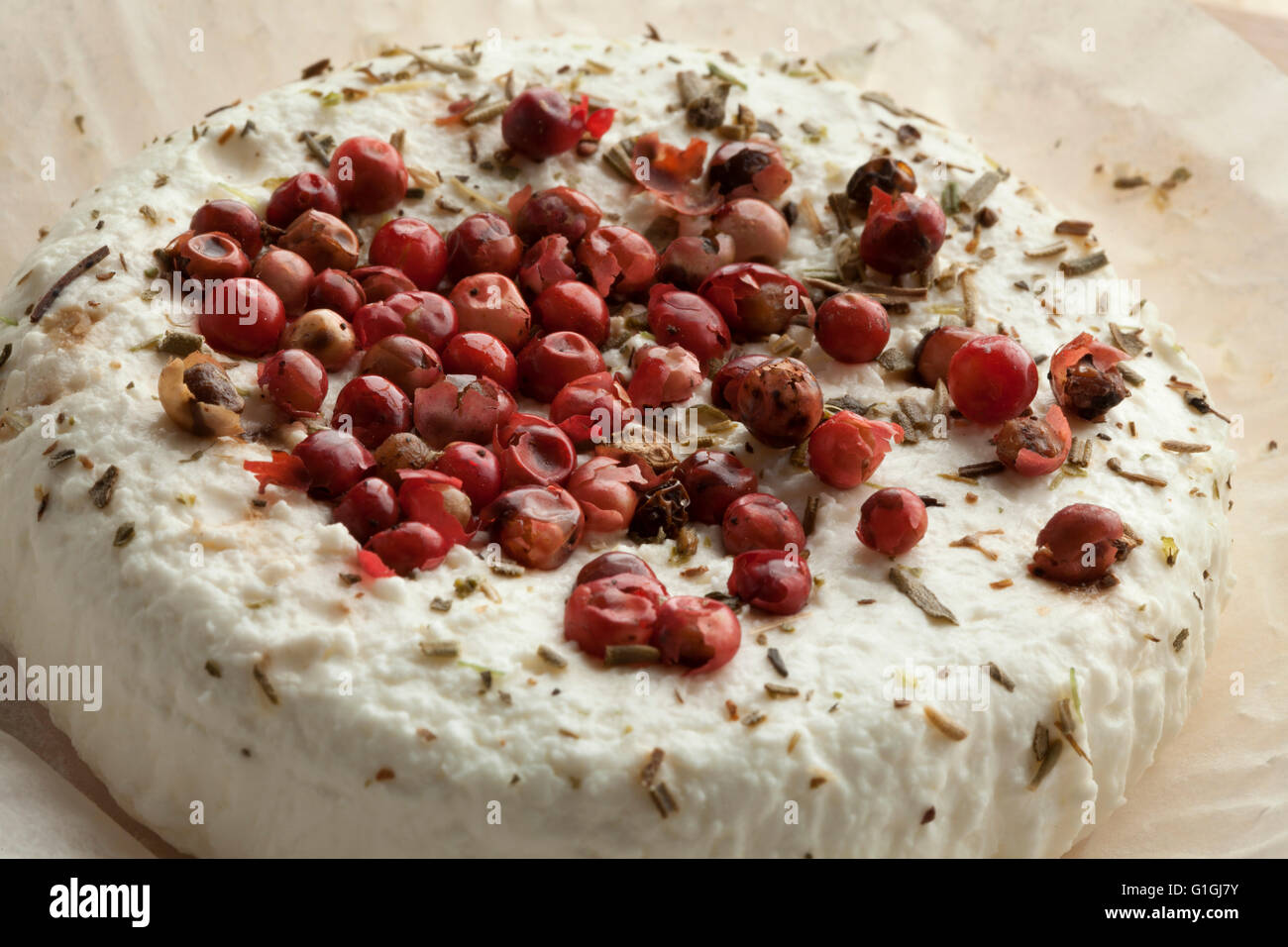 Traditional French goats cheese with pink pepper Stock Photo