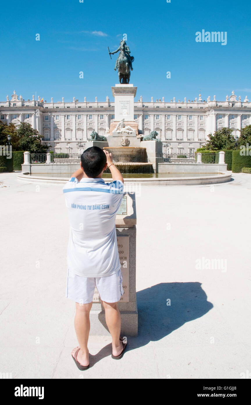Tourist taking photos. Oriente Square, Madrid, Spain. Stock Photo