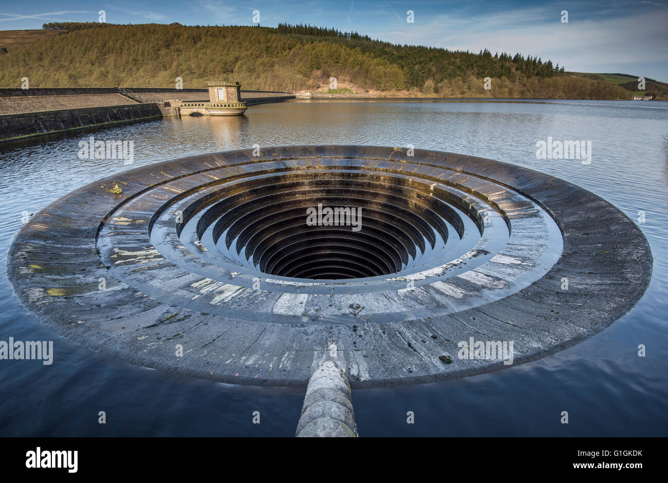 A bellmouth or overflow on Ladybower reservoir has an 80 feet (24 m) diameter. Derbyshire. UK. Stock Photo
